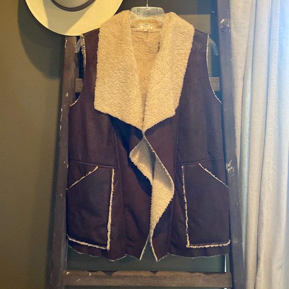 Vest made by Entro. Size Small.